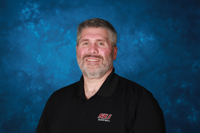 profile image of Andrew Riffey in front of blue background