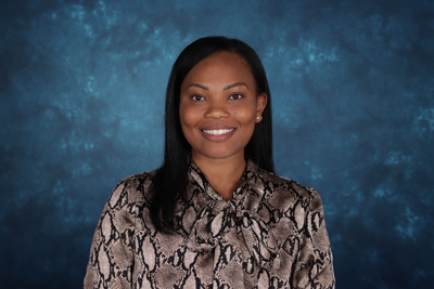 profile image of Jacari Henderson in front of a blue background