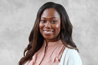 profile image of Marquitta Bowman in front of a blue background