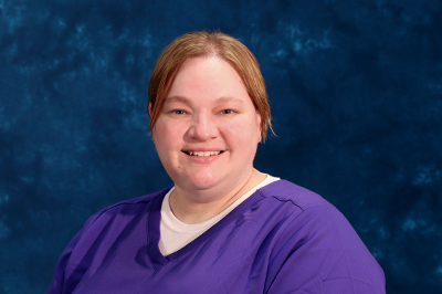 profile image of Nikki Probst in front of a blue background