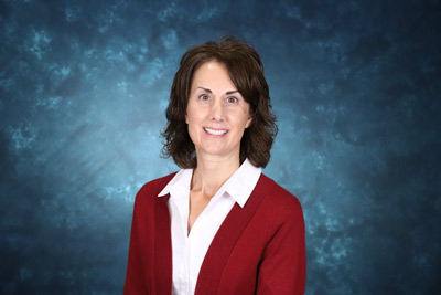 profile image of Sharon Sturgill in front of a blue background