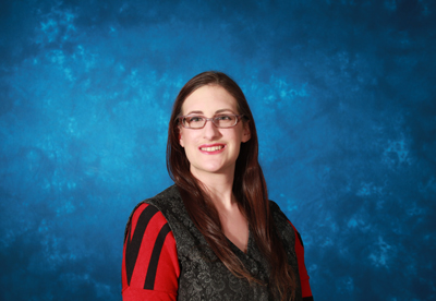 profile image of Rose Robinson-Berkman in front of a blue background